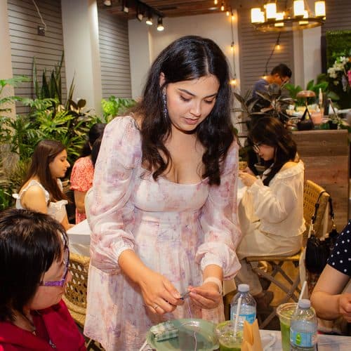Jasmine helping at the table